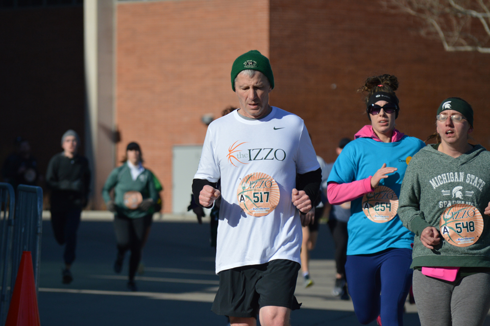 Dr. Steve Chermak crosses the 5K finish line