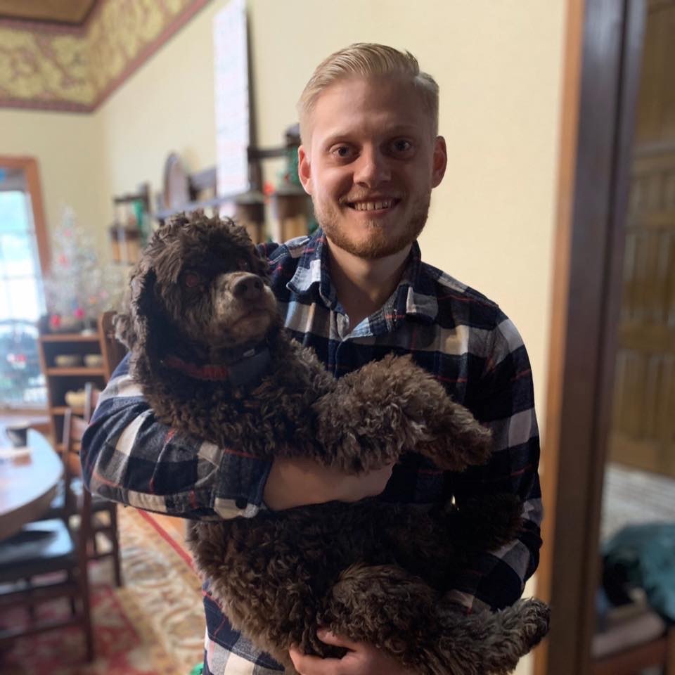 Photo of Isaac Slajus and his dog